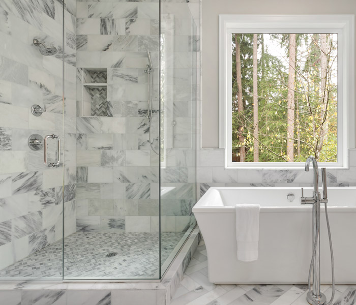 bathroom with shower doors